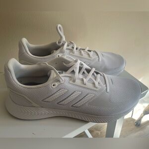 Brand new Adidas tennis shoes. Color is white size 10 women’s.